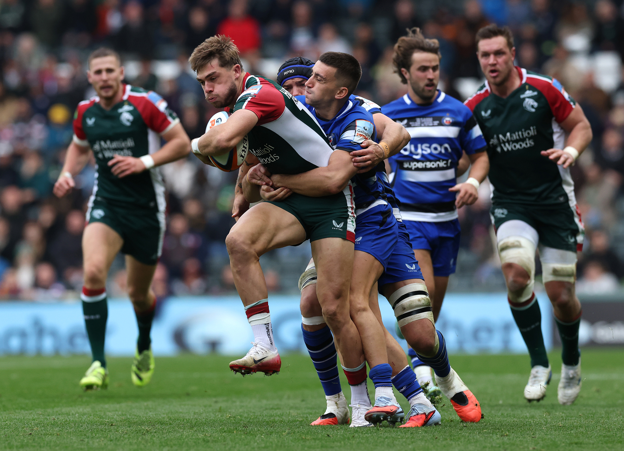 Leicester Tigers' Ollie Hassell-Collins is tackled by Bath's Cameron Redpath during the October 2025 PREM Rugby fixture