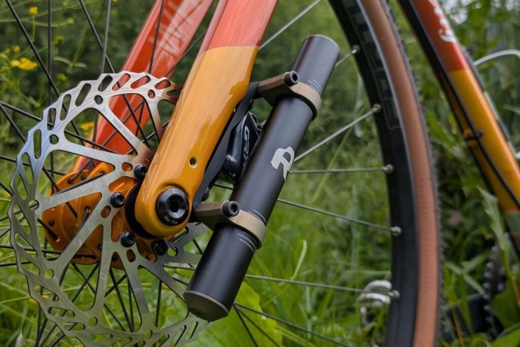 the rimpact TMD Gravel mounted to a gravel bike's rigid fork.